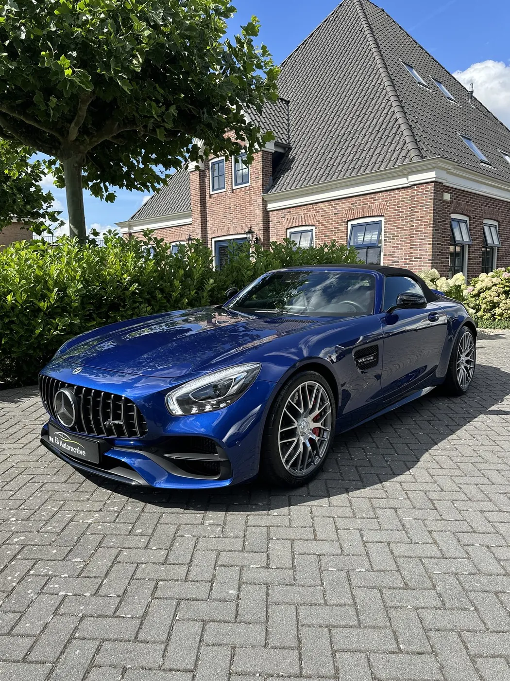 Blauwe Mercedes-AMG GT C bij EB Automotive